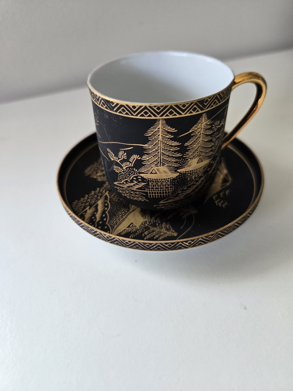Elegant Black and Gold Porcelain Teacup and Saucer Set Japanese